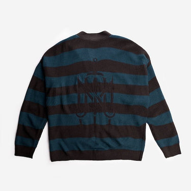 Backside of the Critical Role The Mighty Nein Brown and Blue striped cardigan showing The Mighty Nein logo embroidered 