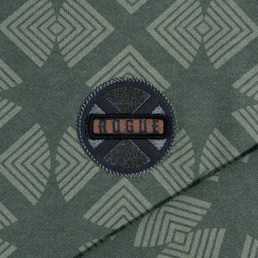 Close-up of Rogue patch on green X-Men Rogue Crew Sweatshirt featuring an intricate geometric pattern, black ribbed cuffs and hem.