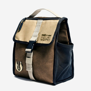 A Star Wars Jedi themed Lunch Box with a beige flap with aurebesh reading "Use the Force" and the main compartment is brown with a metal jedi logo. The bag is facing the left to show a side mesh pocket