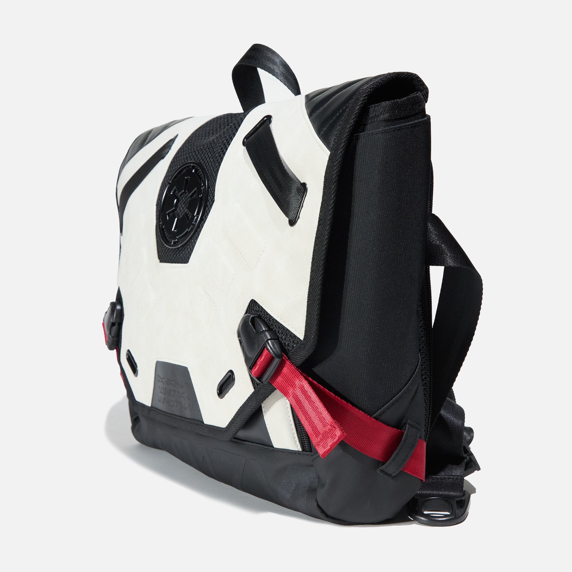 Left side of the Heroes & Villains Star Wars Imperial Army Bike Messenger Bag with a white and black design, featuring the Galactic Empire emblem, red strap accents, and a sleek, modern finish.