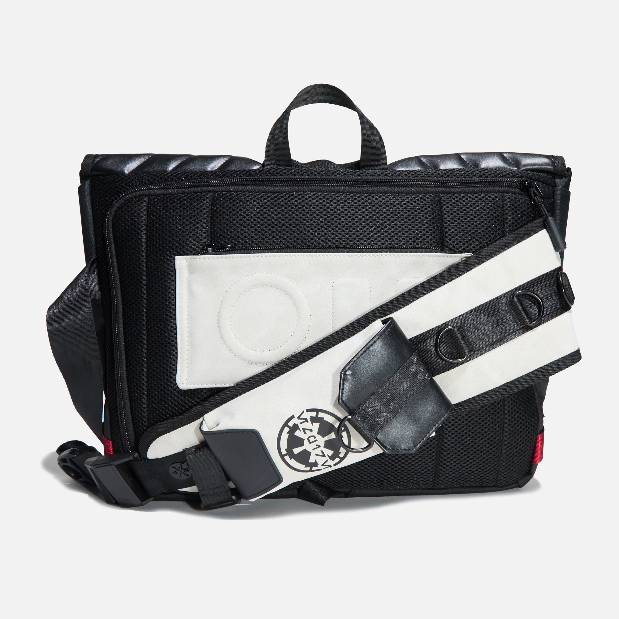 Back view and shoulder strap of the Heroes & Villains Star Wars Imperial Army Bike Messenger Bag with a white and black design, featuring the Galactic Empire emblem, red strap accents, and a sleek, modern finish.