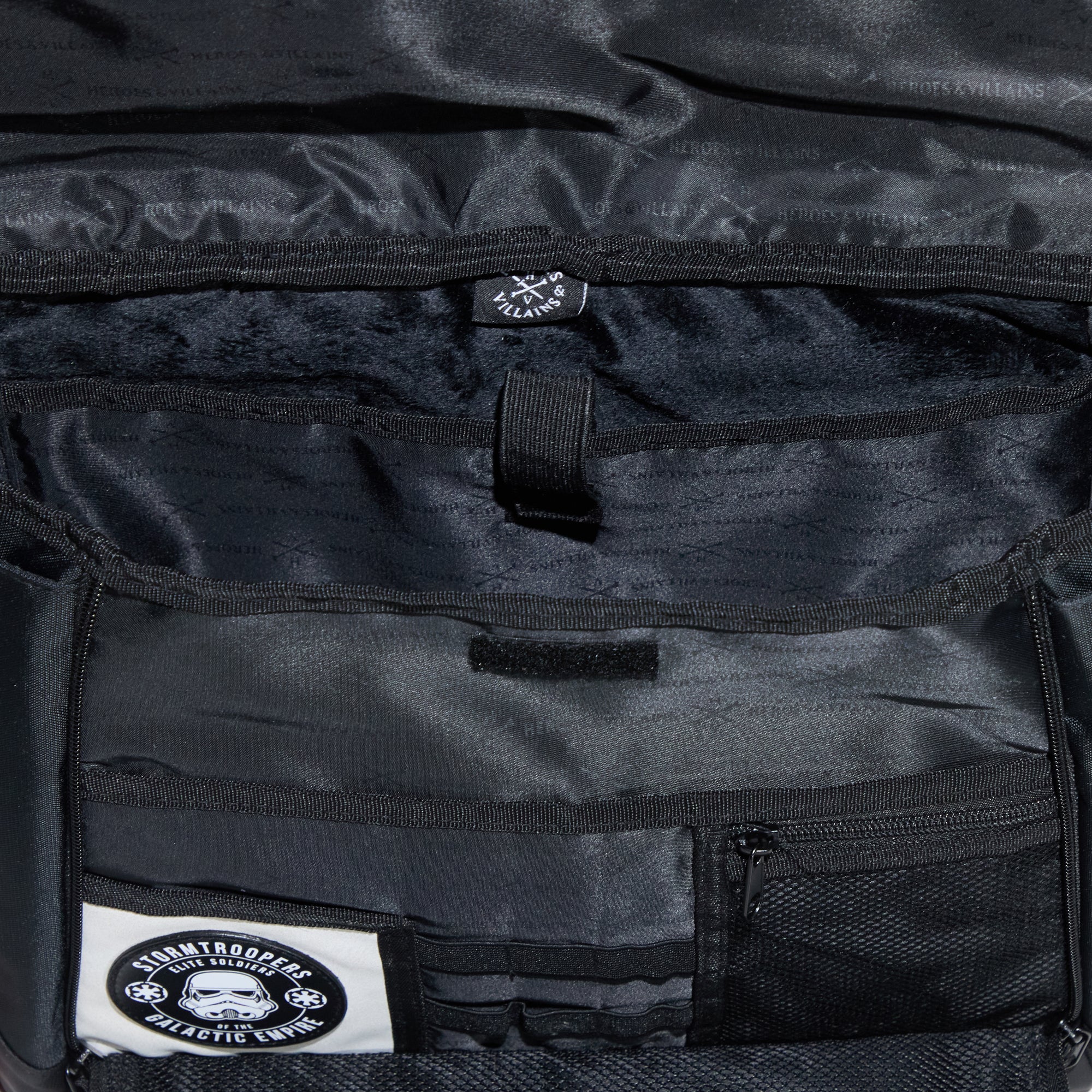 Internal close-up of the Heroes & Villains Star Wars Imperial Army Bike Messenger Bag pockets 