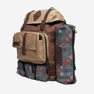 Backpack with floral patterned side panels on a white background