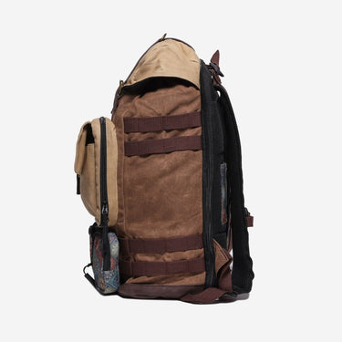 Brown and beige backpack with multiple straps on a white background