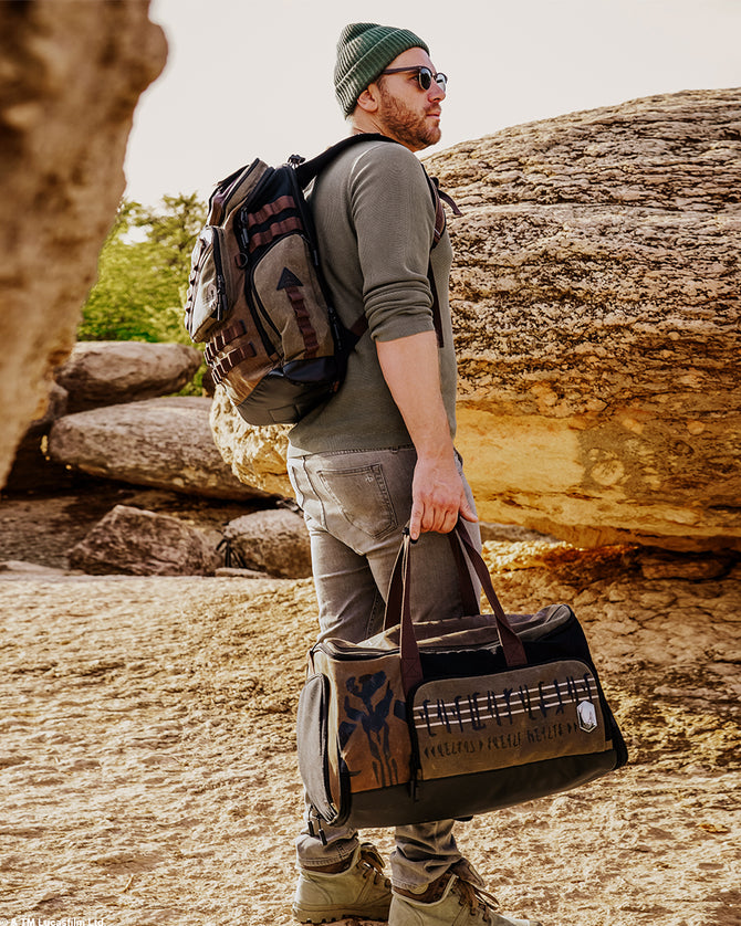 Star Wars The Mandalorian Travel Bag collection featured on an outdoor rocky surface