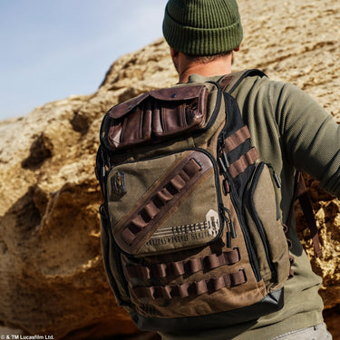 Person wearing a tactical Star Wars Mandalorian backpack in a desert setting