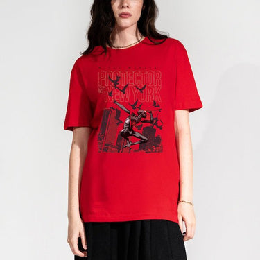 Woman in a Red T-shirt with Miles Morales swinging through New York and the text "Protector of New York."
