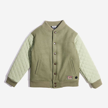 An olive green varsity-style jacket with quilted light green sleeves. The body of the jacket is made of a soft, solid fabric, while the sleeves have a diamond-quilted pattern. It features a ribbed collar, cuffs, and hem, along with a button-up front closure with metallic snap buttons. Two slanted front pockets are integrated into the design. A small rectangular patch with is sewn onto the lower left side of the jacket. The patch features the words "REBELS OF" at the top and "ALDERAAN" at the bottom. 