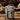 Gray star wars mandalorian themed full size checked suitcase with black design in rocky setting