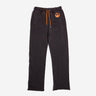 Dark Grey sweatpants with an elastic waistband and orange drawstring, featuring a small orange rebel logo near the left pocket and a vertical "Rebel" graphic printed in distressed black text along the lower left leg.