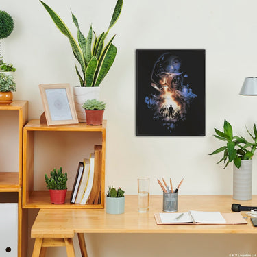 Home office setup with a desk, shelves, and wall art.