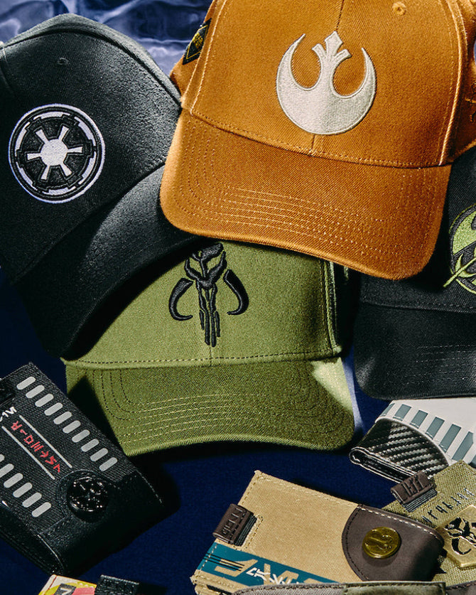Collection of Star Wars-themed merchandise including hats and wallets on a blue background.