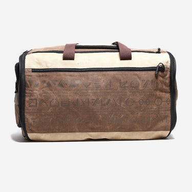 Brown and beige star wars duffel bag with tribal patterns on a white background