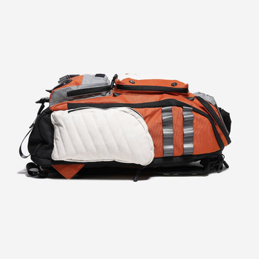 Orange and black duffel bag with reflective stripes on a white background