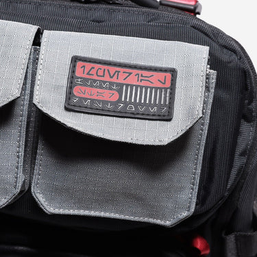 Upclose detail of Aurebesh patch on Star Wars backpack