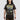 Man in a brown tee featuring a faded graphic of Storm from X-Men