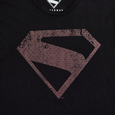 A black t-shirt featuring a large, distressed red Superman logo on the chest.