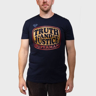 Man in a Navy T-Shirt that says "Truth and Justice" "Superman" 
