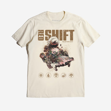 A natural-colored Magic: The Gathering t-shirt featuring Redshift, the Rocketeer Chief, in a chaotic, steampunk-inspired vehicle with a massive rocket strapped to the back. The goblin-like character has wild white hair, glowing eyes, and a mischievous grin as he speeds forward. The distressed artwork includes grunge-style textures, the bold text 'Red Shift' at the top, and Magic: The Gathering mana symbols along the bottom."