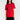 A female model wearing a Dynamic graphic tee featuring a striking silhouette of Daredevil in mid-air, outlined by his signature billy club linework. The bold red background enhances the action-packed design, capturing the essence of Hell’s Kitchen’s guardian.
