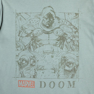 T-shirt with a graphic of a character in armor and 'Marvel Doom' text on a light green background