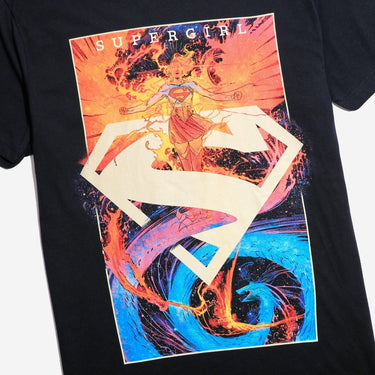 Black t-shirt with Supergirl graphic design featuring colorful swirls and 'Supergirl' text.
