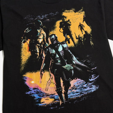 A black Star Wars T-Shirt with Saturated  Orange and Blue toned graphics featuring The Mandalorian