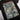 Black t-shirt with Superman graphic and 'Action Comics' cover design on a white background