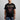 Person wearing a black star wars t-shirt with graphic of Darth Maul on a gray background