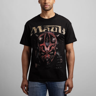 Person wearing a black star wars t-shirt with graphic of Darth Maul on a gray background