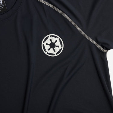 Black shirt with a white emblem on the chest