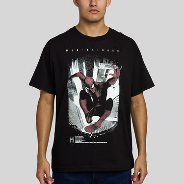 Man in a black short-sleeve t-shirt featuring a graphic print of Spider-Man swinging in a web over a city skyline, with 'WEB-SLINGER' printed above the graphic.