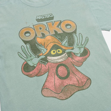 A light green t-shirt featuring a graphic of Orko from the animated series Masters Of The Universe