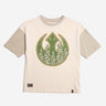 A short sleeved color block t-shirt. The sleeves and collar are tan while the remainder of the shirt is cream colored. The tshirt has a large screen print of the Star Wars Rebel emblem with a wooded overlay. There is a small rectangle patch on the bottom left side that says "Rebels of" at the top and "alderaan" at the bottom. Between the words is a small detailed photo of a forest and mountains.