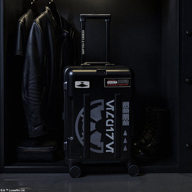 Black Star Wars suitcase with 'Tie Fighter' branding on a dark background