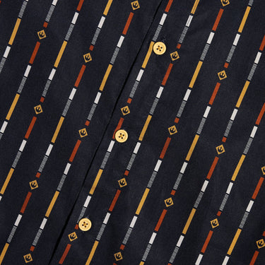 A close up of a button up navy shirt with a star wars rebel motif in a striped pattern