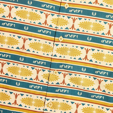 A close up of a button up yellow and teal shirt with a star wars jedi motif in a striped pattern