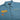 Blue short sleeve button up shirt with embroidered text reading "Nerfhearder" above the chest pocket and two patches on the right chest reading "Fly Casual" and a smaller Rebel Starbird Logo a white background