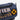 Navy blue bag with embroidered text and a circular patch on a white background