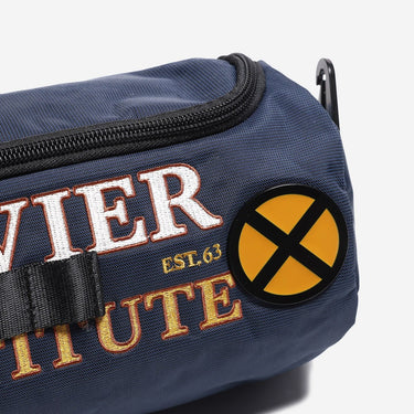 Navy blue bag with embroidered text and a circular patch on a white background