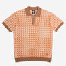 Orange patterned polo shirt with darker orange accents on a white background