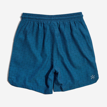 Blue athletic shorts on a light gray background