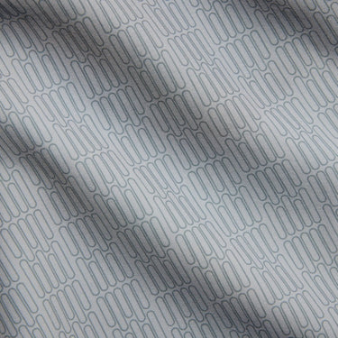 Close-up of gray fabric with a subtle pattern